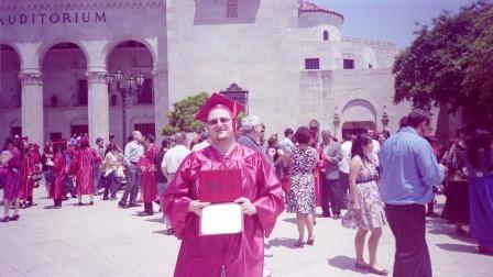 Mike Holding his AA Degree