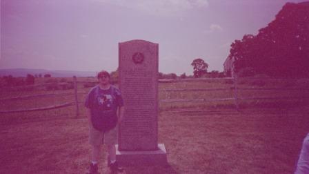 Michael in Front of Texas Regiment Memorial